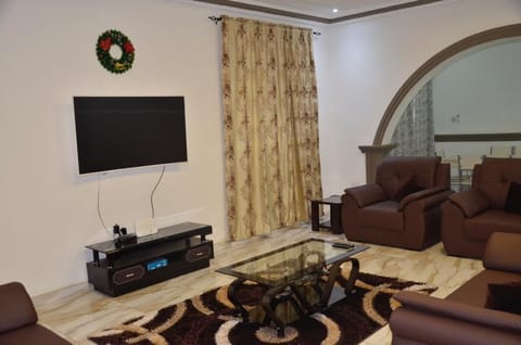 Deluxe Apartment | Living area | Smart TV