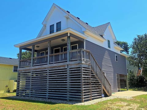 Front of house. Spacious corner lot. Right side borders quiet dead-end street. 