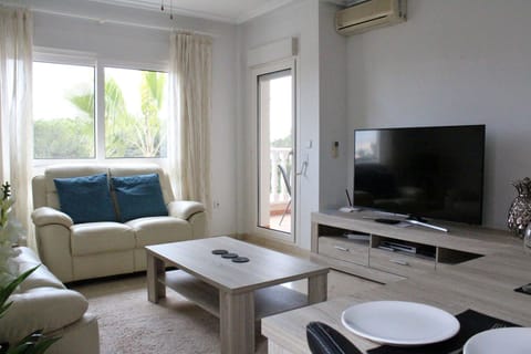 Spacious Living Room with UK TV