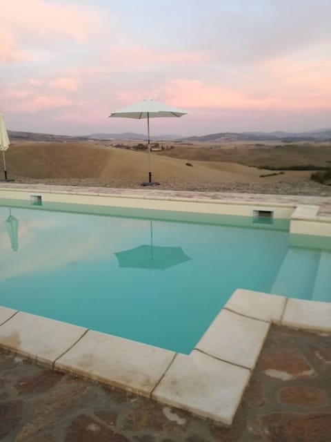 Seasonal outdoor pool, pool umbrellas, sun loungers