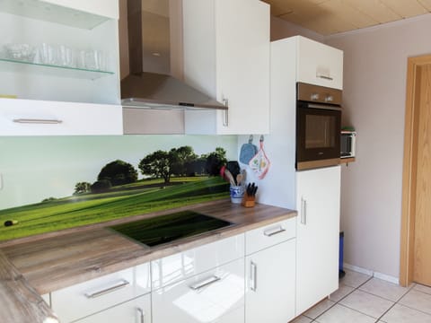 Apartment | Private kitchen | Microwave, stovetop, coffee/tea maker, highchair