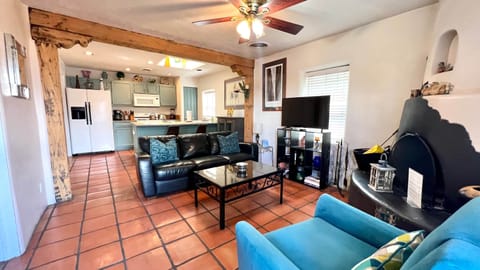 Comfy den that spills into the kitchen 
