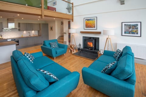 Seating area and log burner, xThe Five Turrets, Scottish Borders