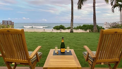 Enjoy the deck and backyard.  The beach is 40 ft from the deck.
