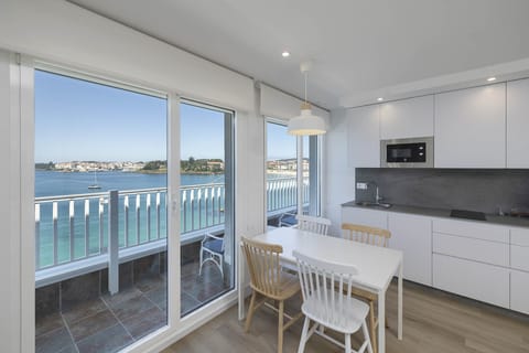 Superior Apartment | Living area | 20-inch TV with digital channels