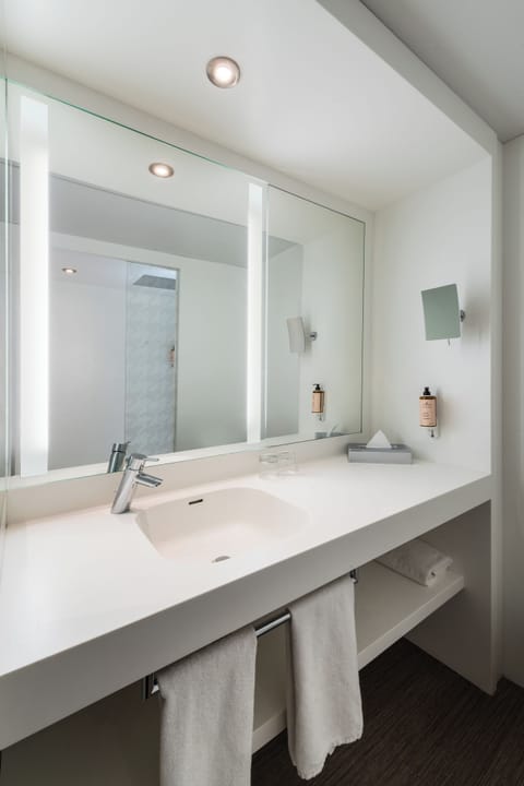 Shower, eco-friendly toiletries, hair dryer, towels