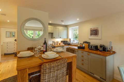 6 Sandy Lane, Carbis Bay. First floor: The shaker style kitchen with a view to the master bedroom