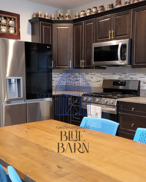 Kitchen with Stainless steel appliances.