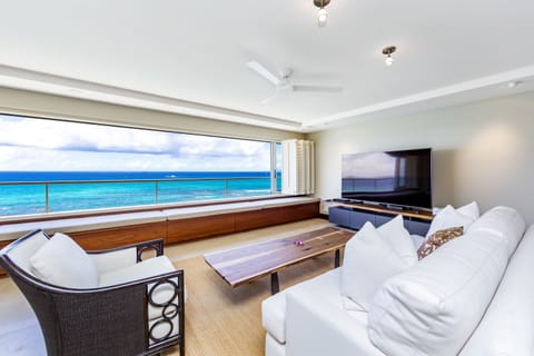 Living Room - Living room area with 42" flat-screen TV and unbelievable ocean views for your daily enjoyment.