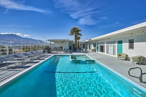 Outdoor pool, pool umbrellas, sun loungers