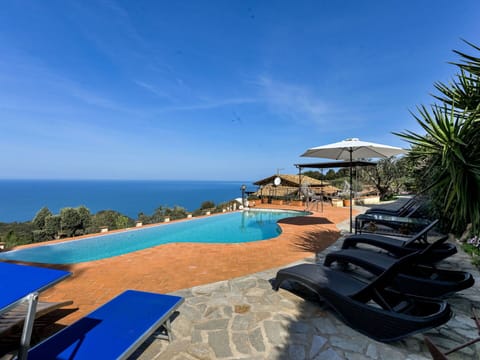 Blue, Horizon, Sea, Coast, Coastal And Oceanic Landforms, Resort, Ocean, Eco Hotel, Shore, Resort Town