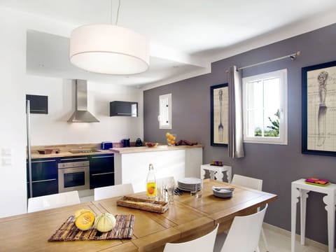 Table, Property, Furniture, Cabinetry, Wood, Tableware, Window, Interior Design, Lighting, Flooring