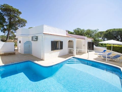 Building, Sky, Property, Swimming Pool, Window, Azure, Plant, Tree, House, Shade
