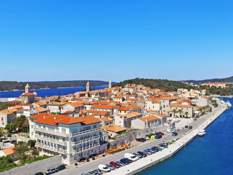 Water, Sky, Building, Property, Azure, House, Coastal And Oceanic Landforms, Urban Design, Landscape, Cityscape