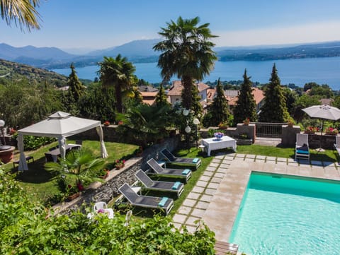 Outdoor pool, open 9:00 AM to 8:00 PM, pool umbrellas, sun loungers