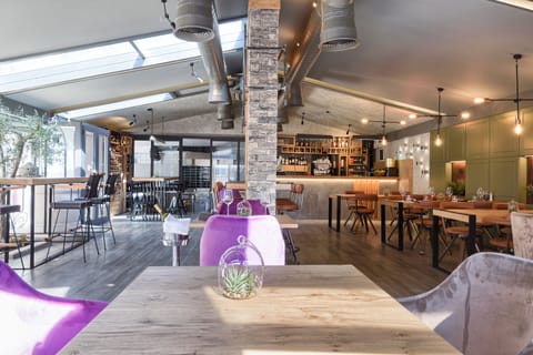 Lunch, dinner served; local and international cuisine, garden views