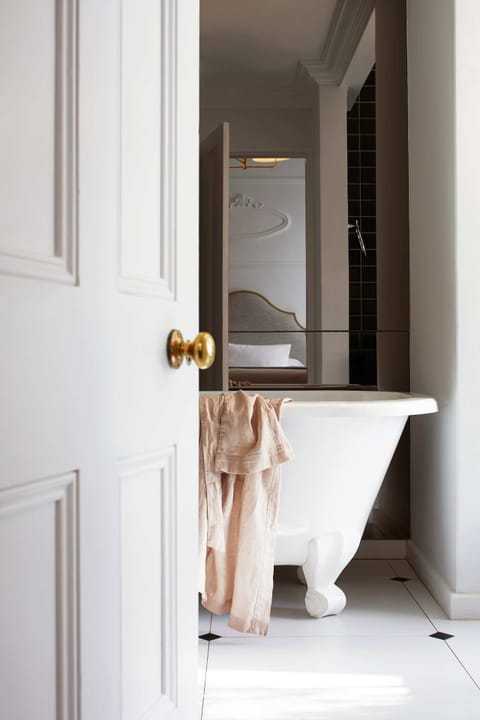 Designer toiletries, hair dryer, bathrobes, slippers