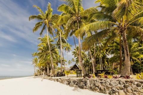 Private beach, white sand, sun loungers, beach towels