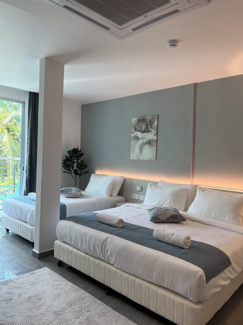 Junior Room, 1 Bedroom | Minibar, blackout drapes, soundproofing, iron/ironing board