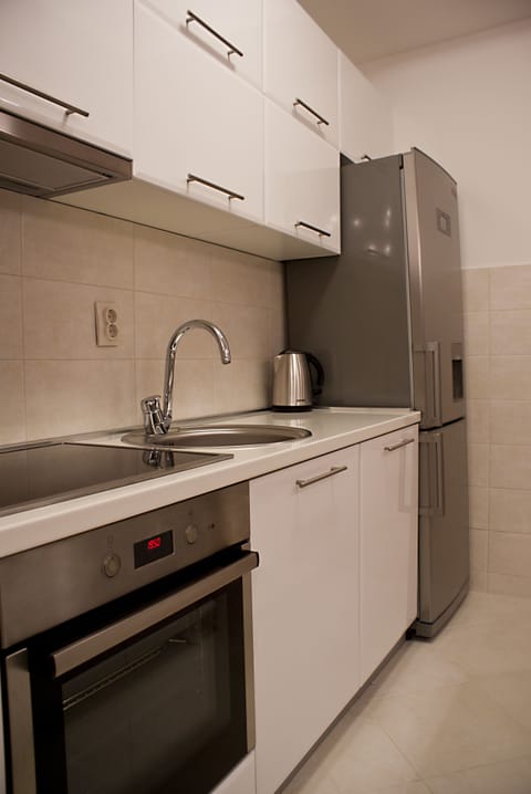 Superior Apartment, 3 Bedrooms, Balcony, Sea View (2 Bathrooms - Jacuzzi) | Private kitchen | Full-size fridge, stovetop, coffee/tea maker, electric kettle