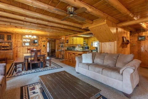 With plenty of space for everyone to sit and enjoy one another, this cozy lumber cabin has all the comforts of home.