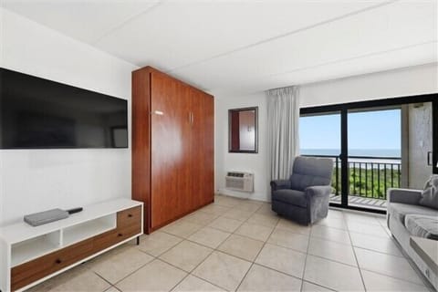 Condo 225 - Murphy bed closed with wall mounted 50" smart tv