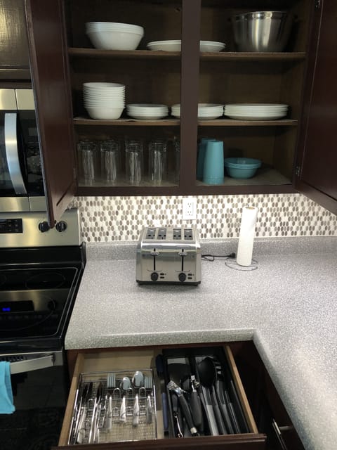 Cups, plates, bowls, utensils and cooking utensils