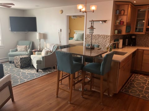 Open floor plan kitchen and relaxing living room.