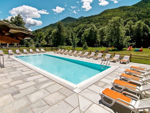 Water, Cloud, Sky, Mountain, Property, Swimming Pool, Tree, Azure, Building, Outdoor Furniture