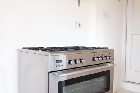 Mini-fridge, microwave, oven, stovetop