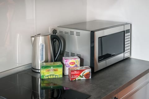 Full-size fridge, microwave, stovetop