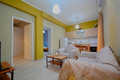 Apartment, 2 Bedrooms | Living room | Flat-screen TV