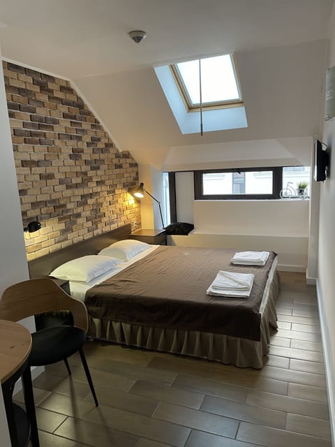 Double Room, City View | Soundproofing, iron/ironing board, free WiFi, bed sheets