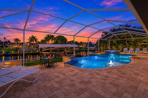 Vacanza Rentals - Villa Santa Rosa pool area at sunset