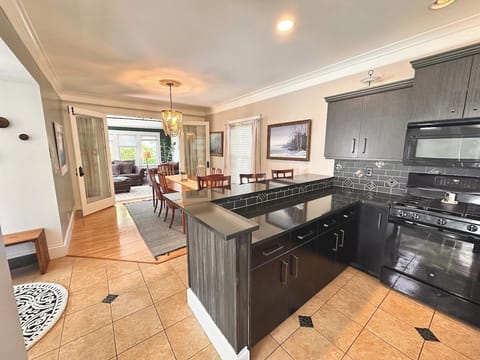 Kitchen has 2 bar areas for lots of seating