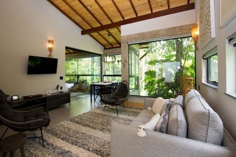 Superior Chalet, 1 King Bed with Sofa bed, Jetted Tub, Garden View | Living room | 40-inch LED TV with satellite channels, TV, DVD player