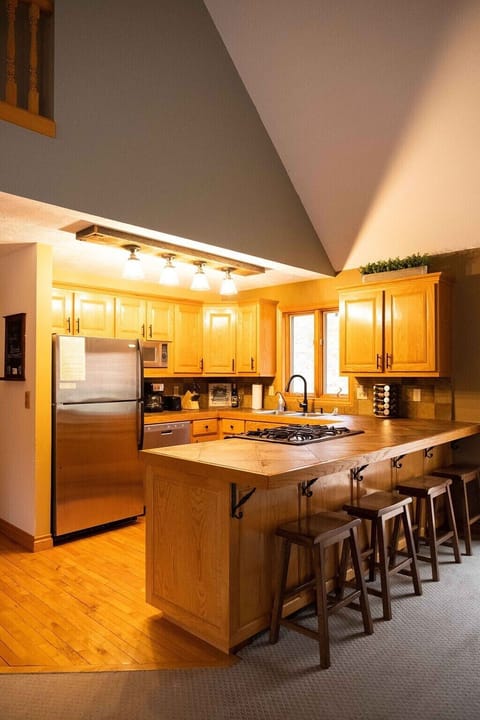 Kitchen with all stainless steel appliances including dishwasher and microwave. Fully stocked to make your vacation turn key. A spice rack is included.