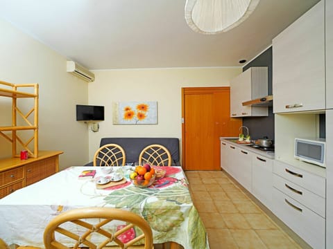 Cabinetry, Furniture, Property, Countertop, Drawer, Interior Design, Wood, Orange, Flooring, Floor