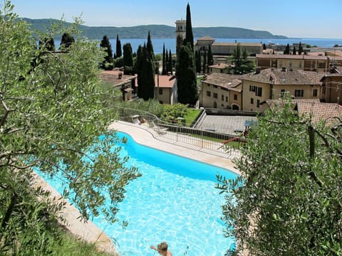 Water, Sky, Plant, Property, Building, Azure, Tree, Natural Landscape, Body Of Water, Swimming Pool