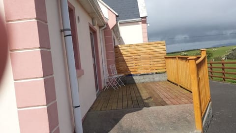 Patio Area with wonderful views - House and decking was painted since this pic!
