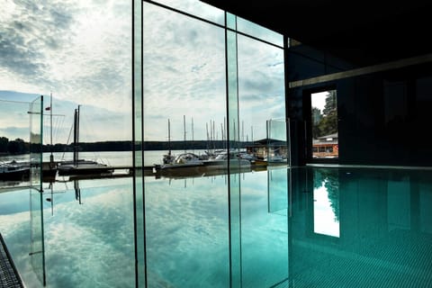Indoor pool, open 7:00 AM to 9:00 PM, sun loungers
