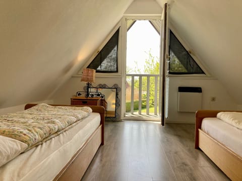 Bungalow, 3 Bedrooms, Balcony, Garden View | 3 bedrooms, travel crib