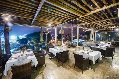 Breakfast, lunch, dinner served; international cuisine, pool views