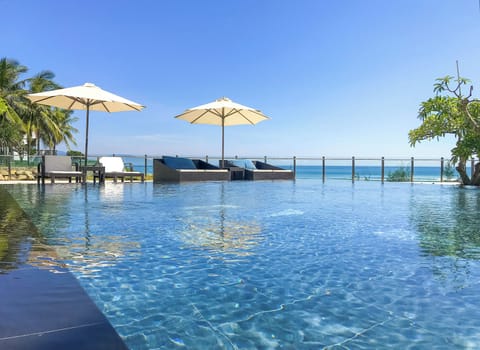 2 outdoor pools, open 6:00 AM to 6:00 PM, pool umbrellas, sun loungers