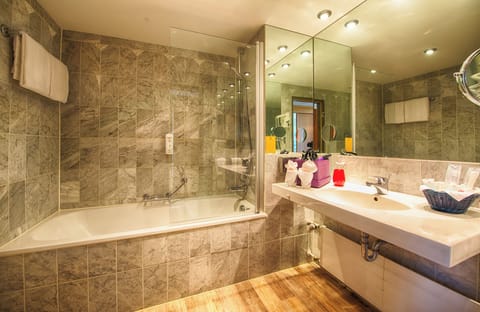 Eco-friendly toiletries, hair dryer, towels