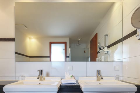 Deep soaking tub, free toiletries, hair dryer, bathrobes