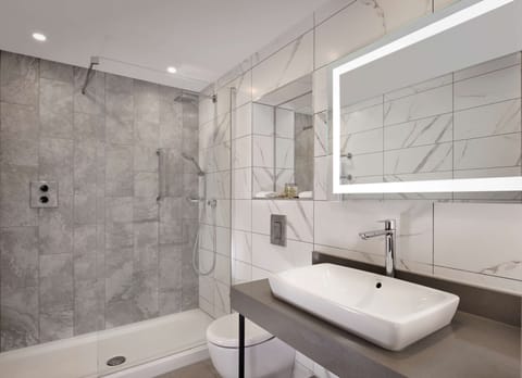 Shower, free toiletries, hair dryer, towels