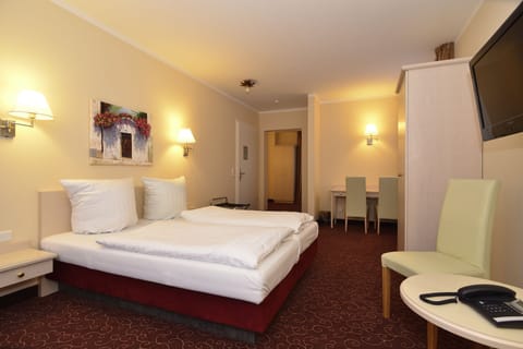 Hypo-allergenic bedding, desk, blackout drapes, soundproofing