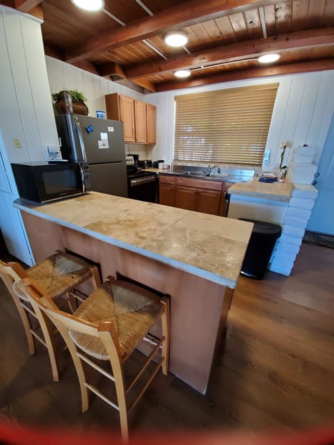 Premium Apartment (Marlin Apartment-1st Floor-waterview) | Private kitchen | Fridge, microwave, coffee/tea maker, toaster