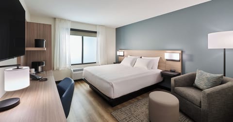 Room, 1 King Bed (Mobility Accessible Roll-in Shower) | Desk, laptop workspace, blackout drapes, iron/ironing board